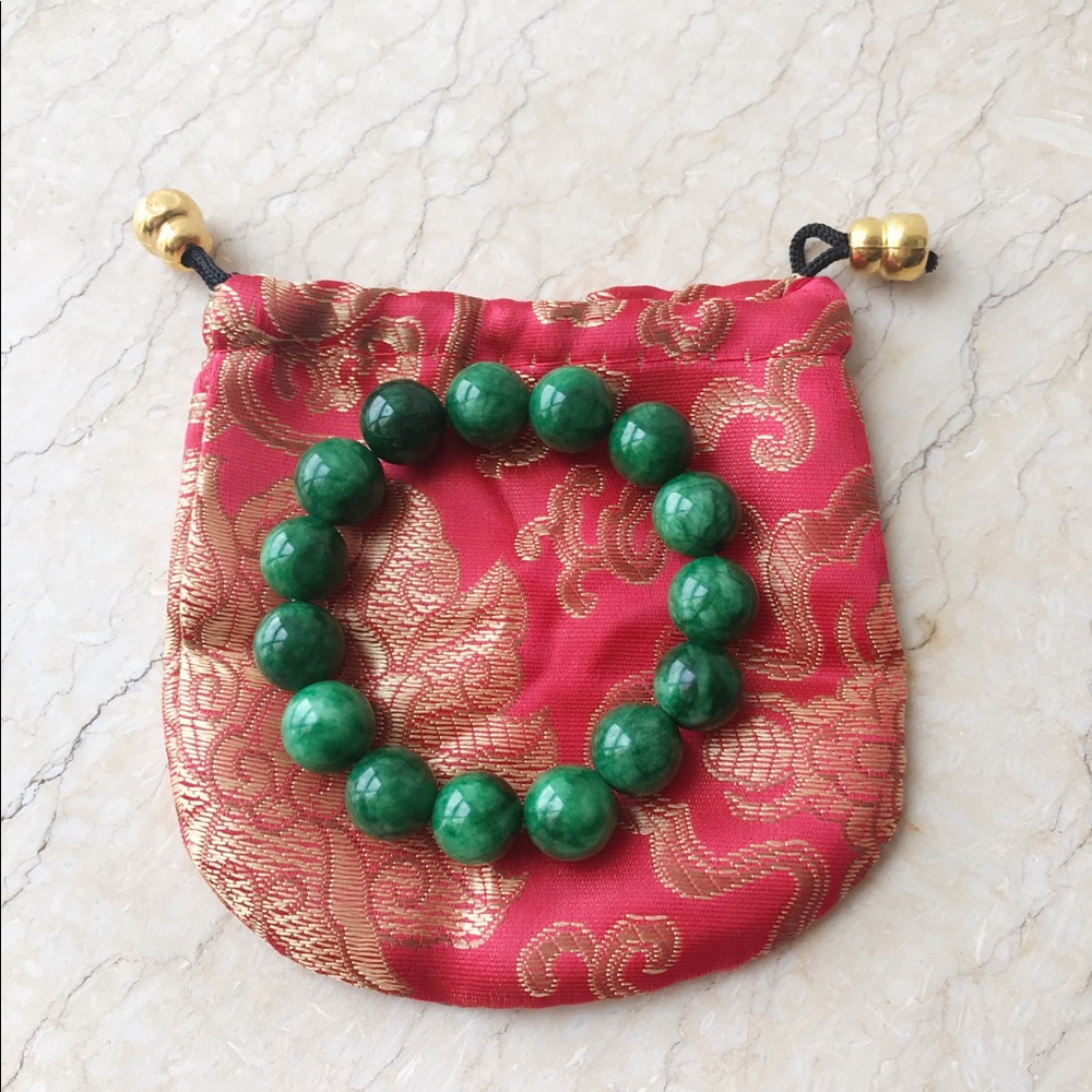 Auth jade bean bracelets with silk pouch